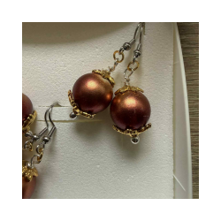 Julereringe med rd/orange julekugle  messingdetaljer