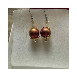 Julereringe med rd/orange julekugle  messingdetaljer